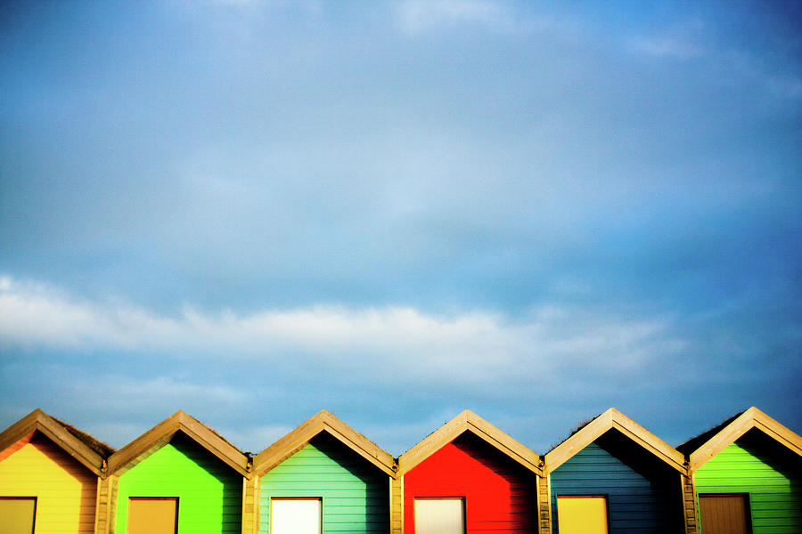 Colourful Beach Huts Photograph by David Sharpe
