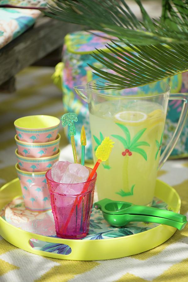 Colourful Beakers And Jug Of Refreshing Drink On Tray Photograph by Winfried Heinze