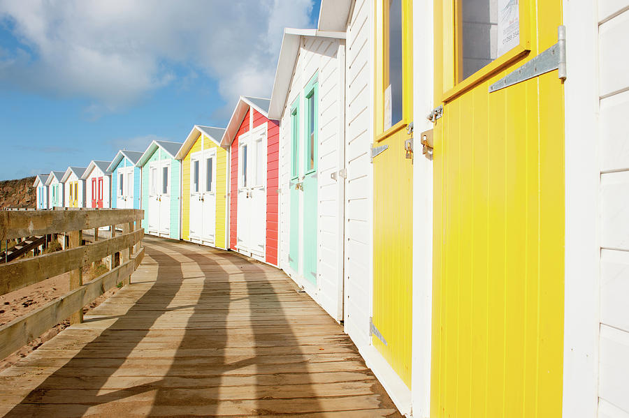 Colourful Bude Beach Huts Photograph by Helen Jackson