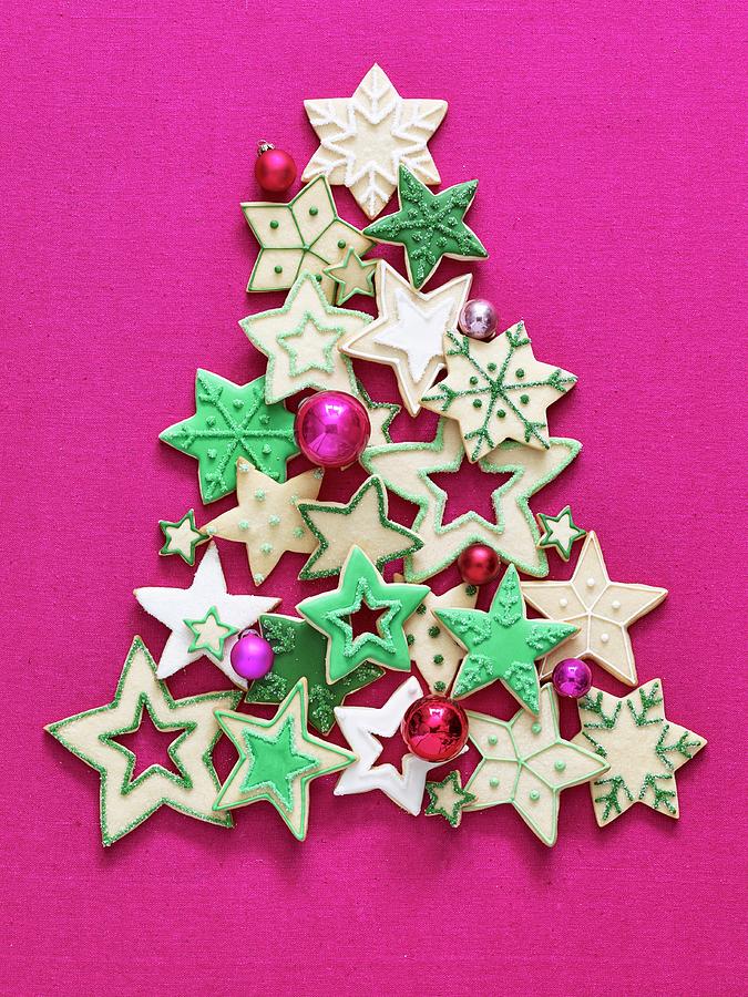 Colourful Christmas Star Biscuits In The Shape Of A Christmas Tree Photograph by Antonis Achilleos