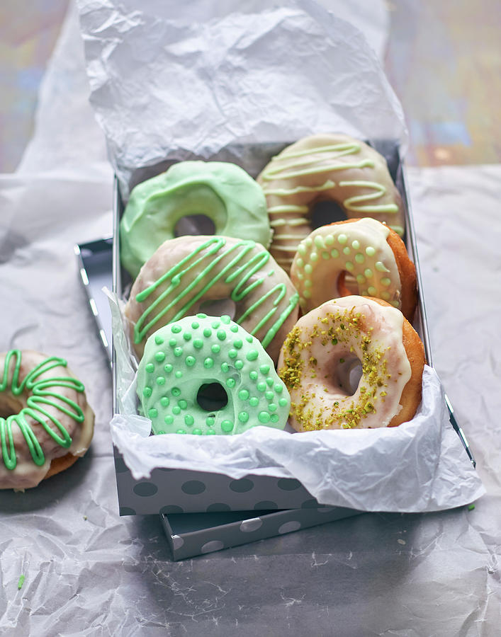 Colourful Doughnuts In A Gift Box Photograph by Angelika Grossmann