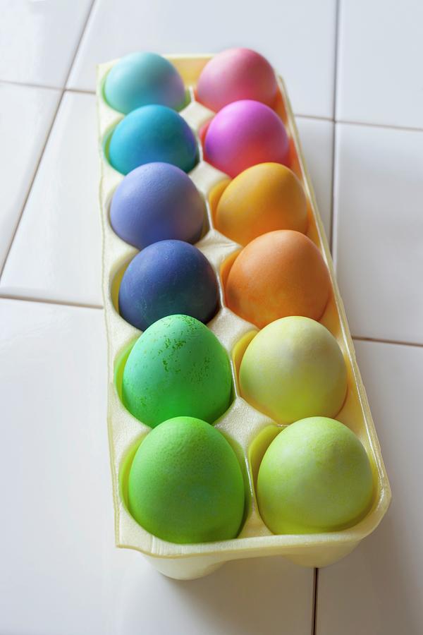 Colourful, Dyed Easter Eggs In An Egg Boxx Photograph by Katharine Pollak
