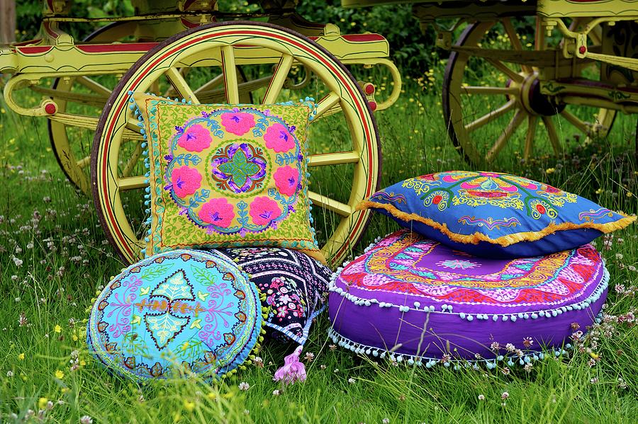 Colourful Ethnic Cushions In Front Of A Carriage On A Field Photograph by Winfried Heinze