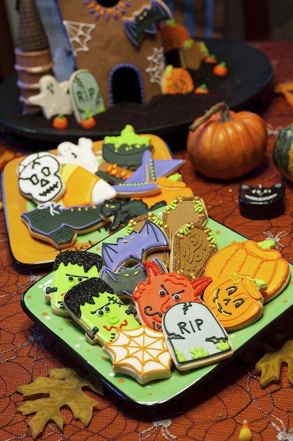 Colourful Halloween Biscuits And Halloween Decorations Photograph by Rank, Erik