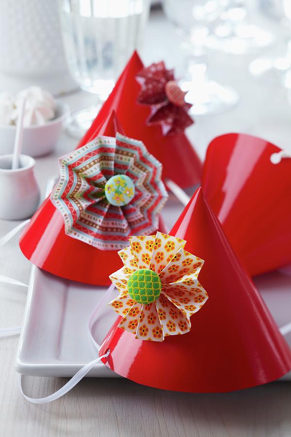 Colourful Paper Flowers Decorating Red Party Hats Photograph by Franziska Taube