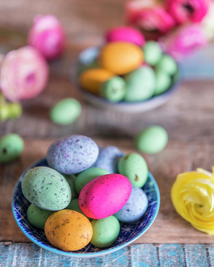 Colourful Speckled Eggs In Bowls Photograph by Stuart Cox