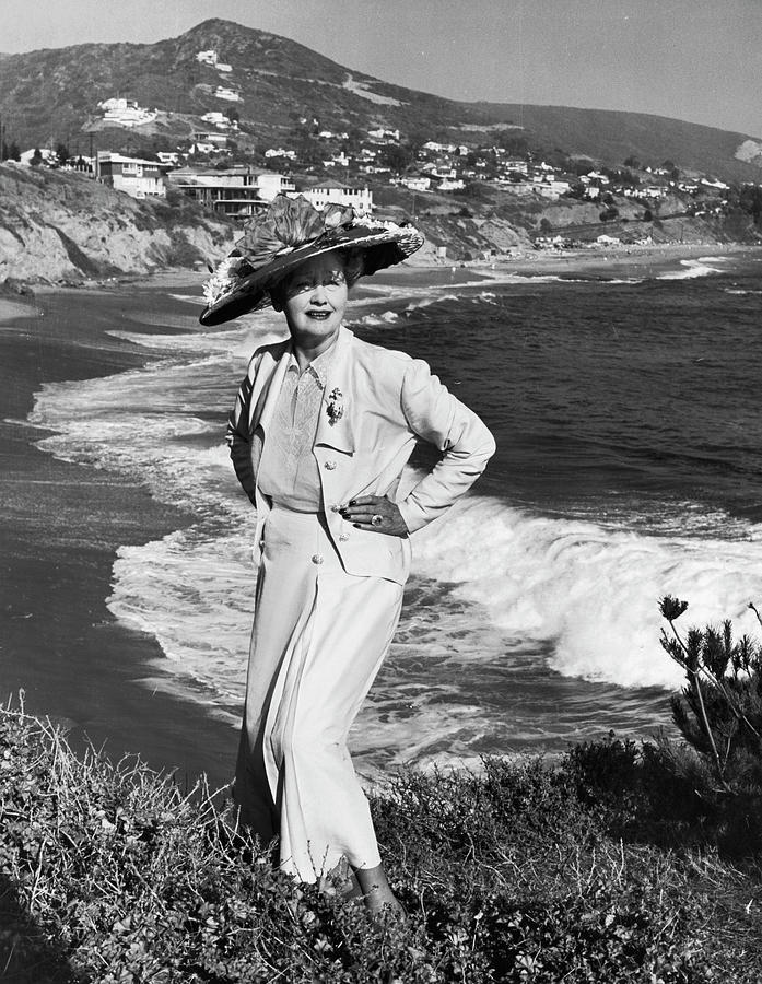 Columnist Hedda Hopper Posing On Cliff Photograph by Alfred Eisenstaedt Columnist Hedda Hopper Posing On Cliff Photograph by Alfred Eisenstaedt