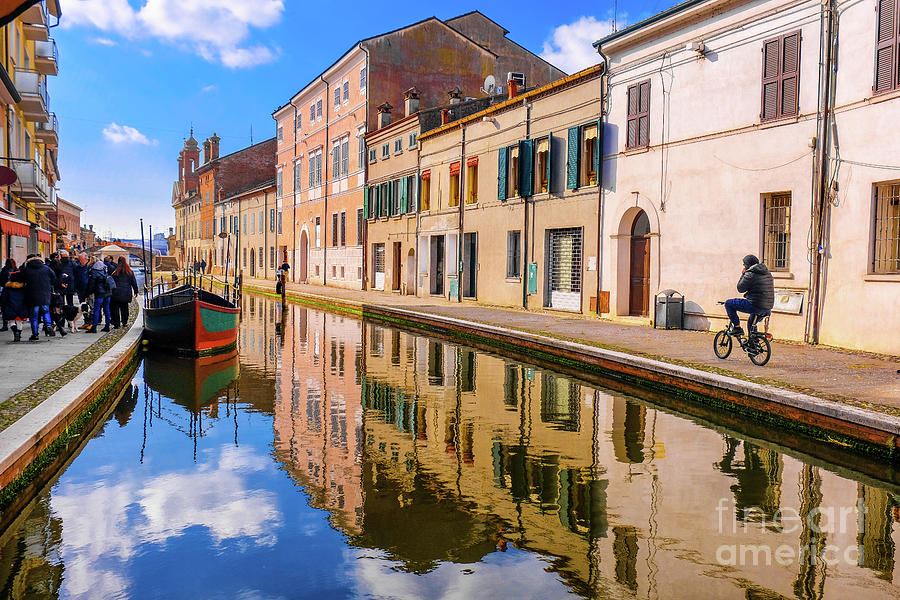 Comacchio Ferrara province Emilia Romagna region cycling in Italy blue sky over canal Photograph by Luca Lorenzelli