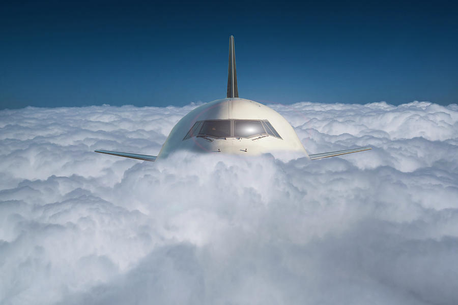 Commercial Jet In A Sea Of Clouds Photograph by Buena Vista Images