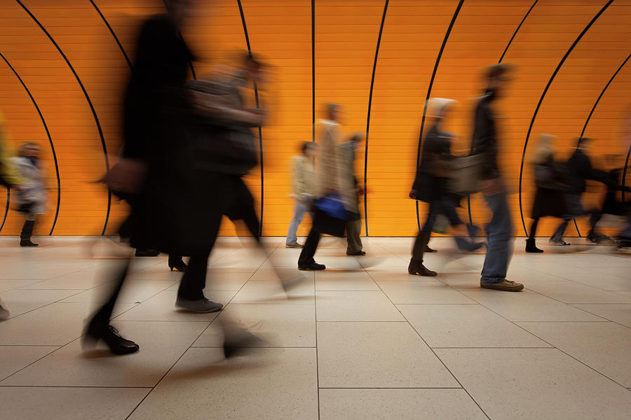 Commuters On Modern Subway With Orange Photograph by Sebastian-julian