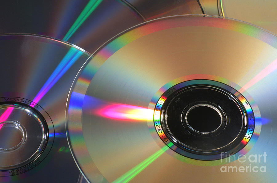 Compact Discs Photograph by Daniel Sambraus/science Photo Library