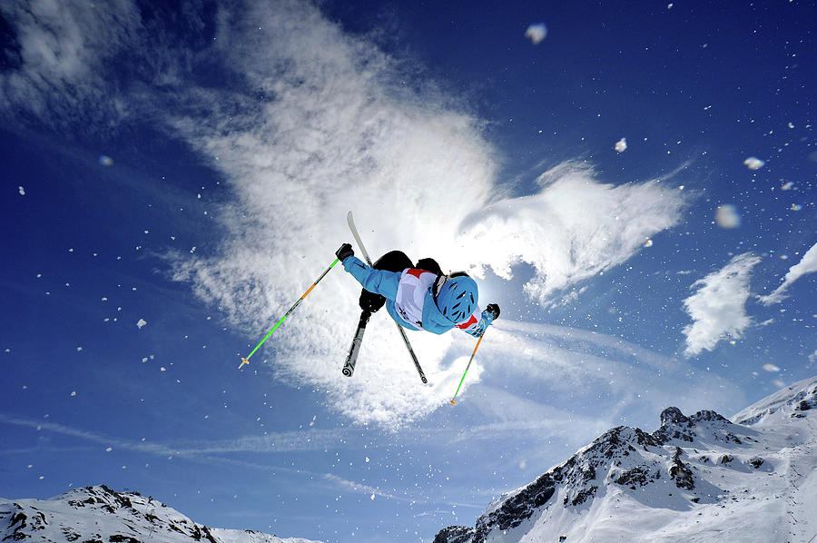 Competitive Mogul Skier Jumps Off A Photograph by Agence Zoom