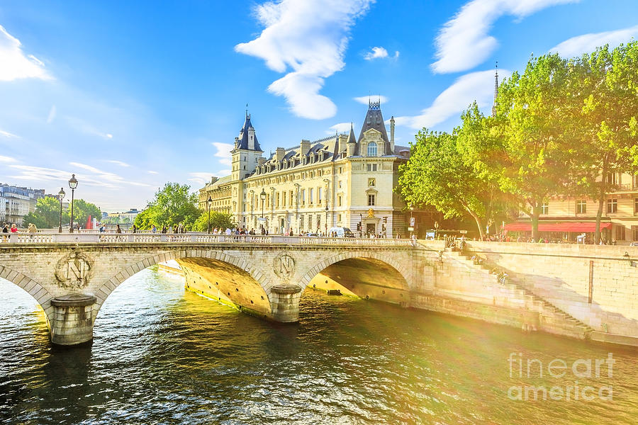 Conciergerie and Pont au Change Photograph by Benny Marty