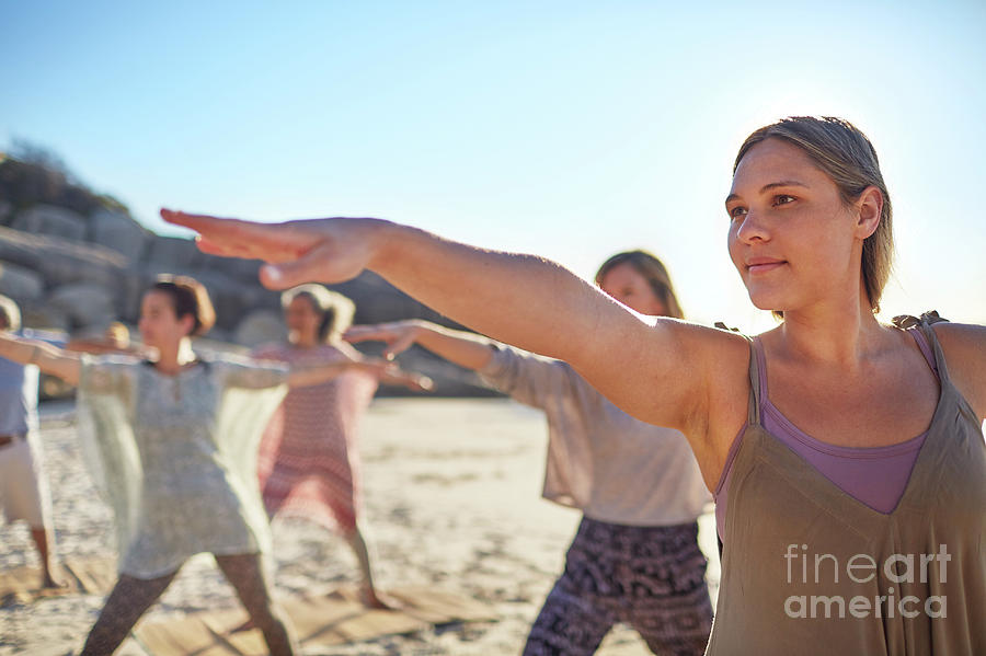 Agility Photograph - Confident Woman Practicing Warrior 2 Pose by Caia Image/science Photo Library Agility Photograph - Confident Woman Practicing Warrior 2 Pose by Caia Image/science Photo Library