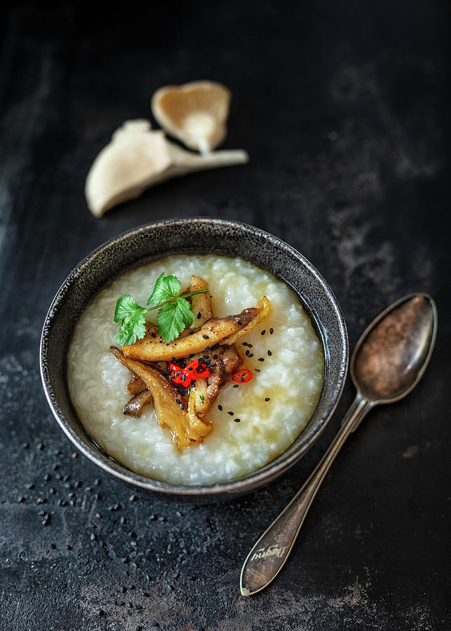 Congee With Oyster Mushrooms, Chicken, Chili And Fish Sauce Photograph by Jan Wischnewski
