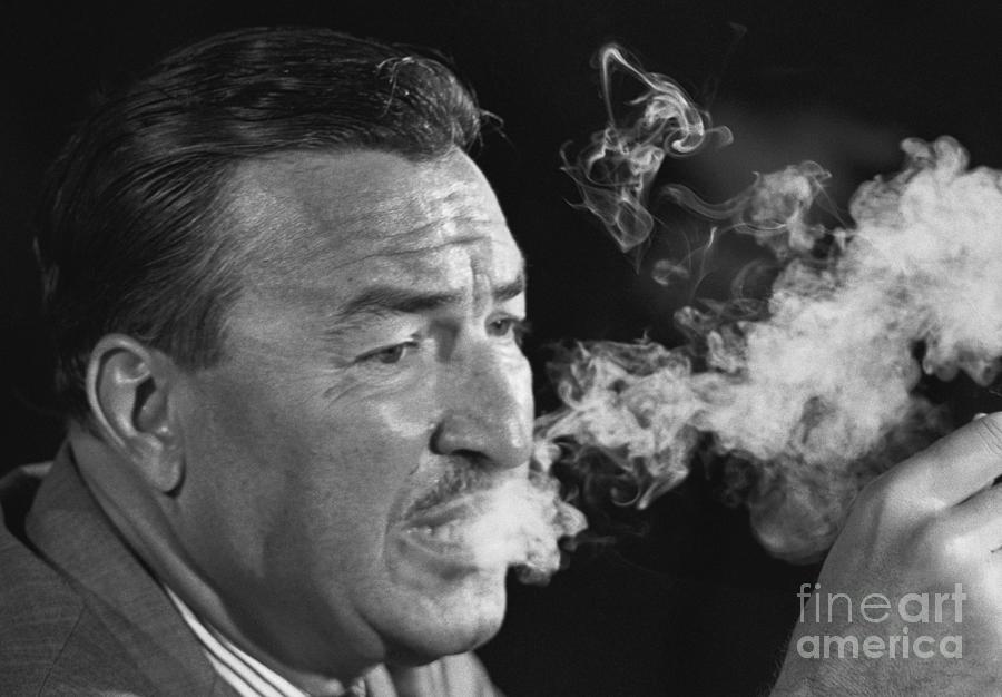 Congressman Adam Clayton Powell Smoking Photograph by Bettmann