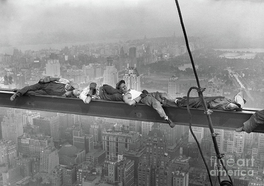 Construction Workers Resting On Steel Photograph by Bettmann