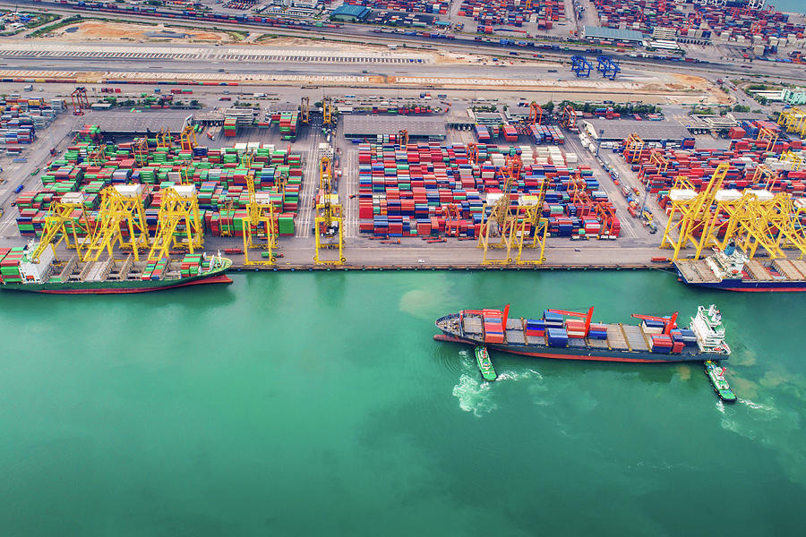 Container port and container ship transportation Photograph by Anek Suwannaphoom