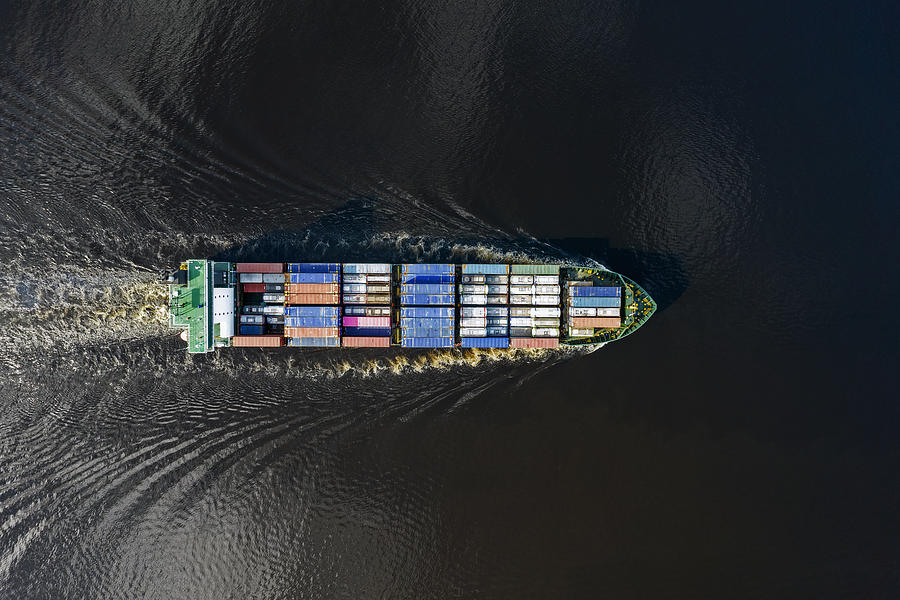 Container Ship With Sea Containers In Sea Photograph by Alexander Bondarenko