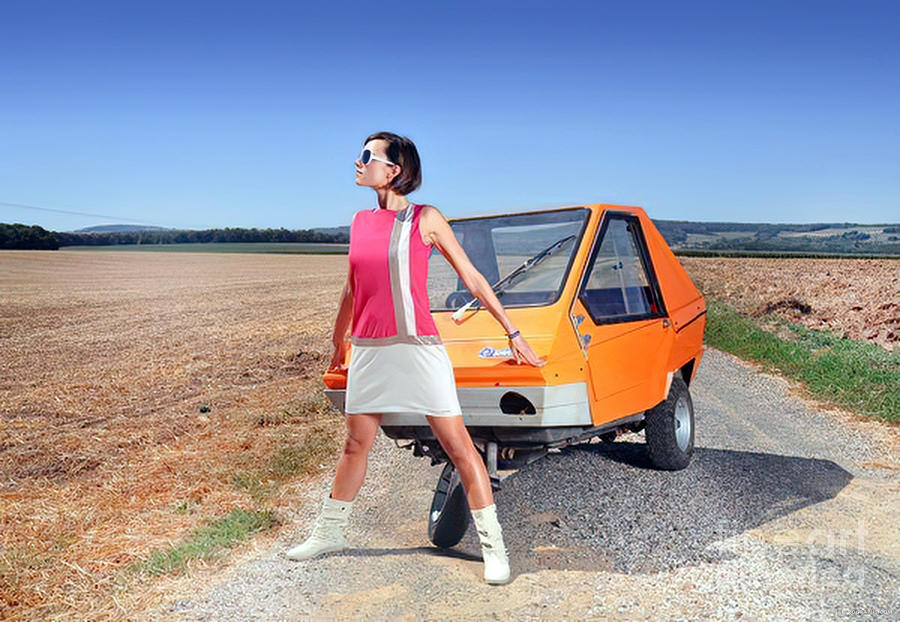 Vintage Photograph - Contemporary Image Of Sixties Model And Cyclops Car by Retrographs