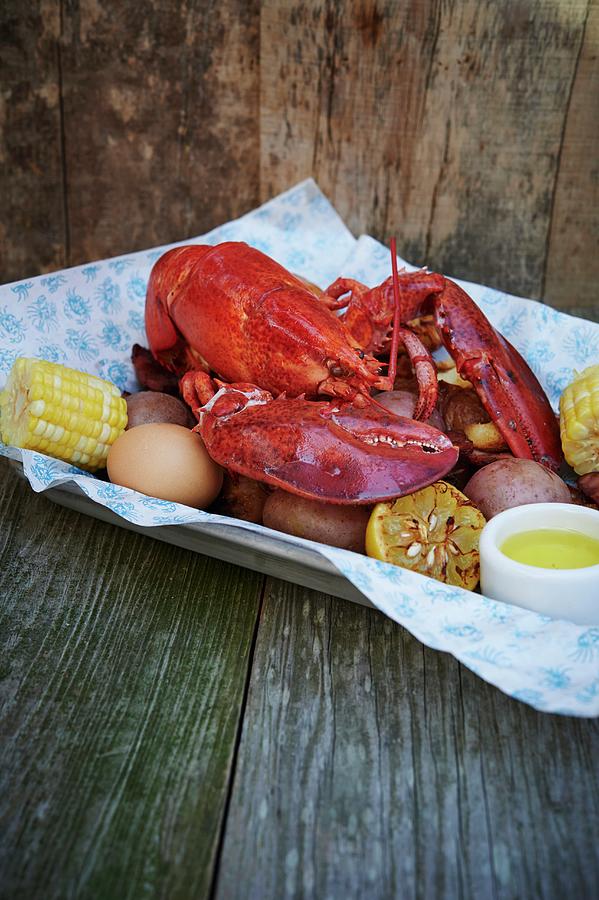 Cooked Lobster With Corn Cobs And Potatoes Photograph by Greg Rannells