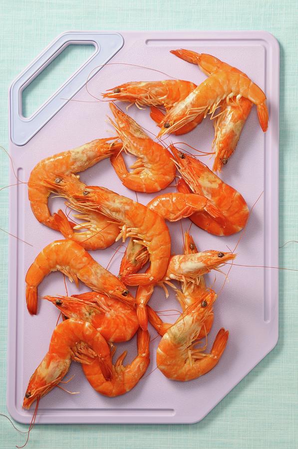 Cooked Prawns On A Chopping Board Photograph by Jean-christophe Riou