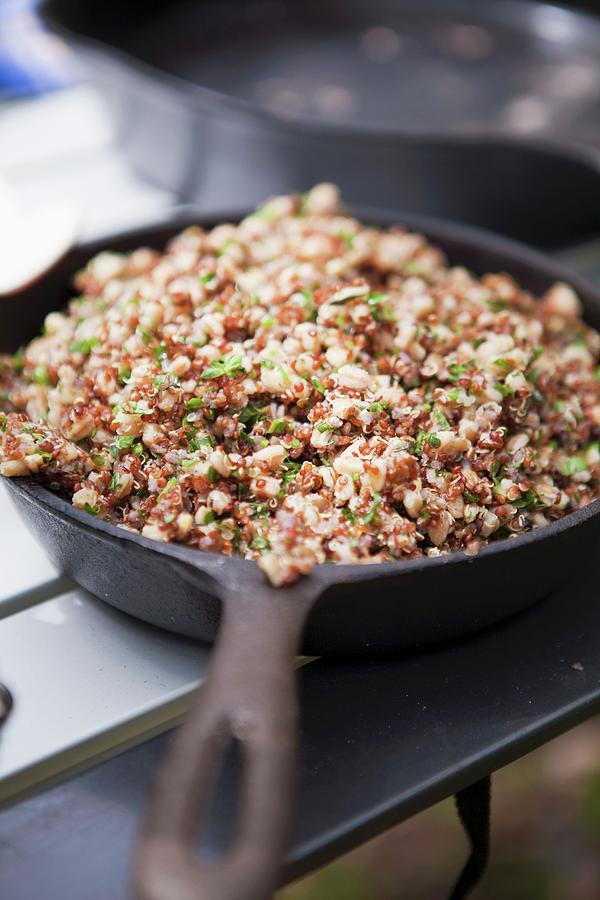 Cooked Quinoa In A Cast Iron Pan Photograph by Rebecca Stumpf