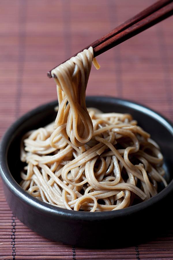 Cooked Soba Noodles With Chopsticks Photograph by Mche, Hilde
