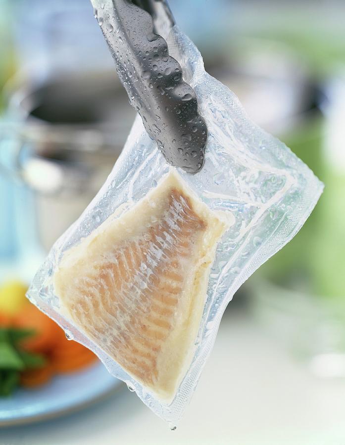 Cooked Vacuum-packed Haddock Fillet Photograph by Roulier-turiot