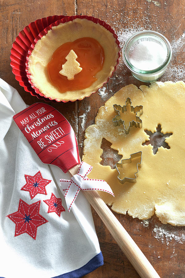 Cookie Dough With A Cookie Cutter And A Christmas Themed Spatula Photograph by Inge Ofenstein