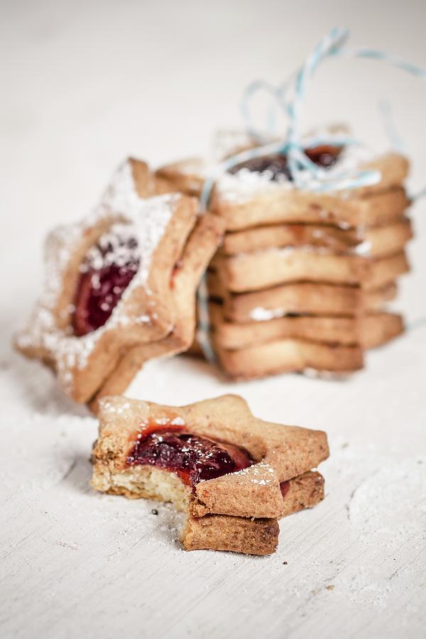 Cookie Tower With Ribbon And Jelly Filled Cookie With A Bite Taken Out Of It Photograph by Susan Brooks-dammann