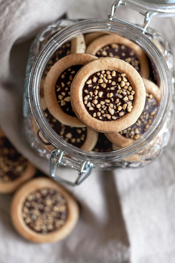 Cookies With Chocolate And Hazelnut Crumbs In A Glass Jar Photograph by Sonya Baby