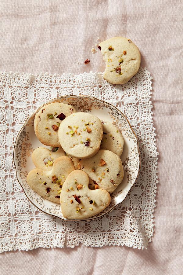Cookies With Pistachios And Dried Rose Petals Photograph by Stacy Grant