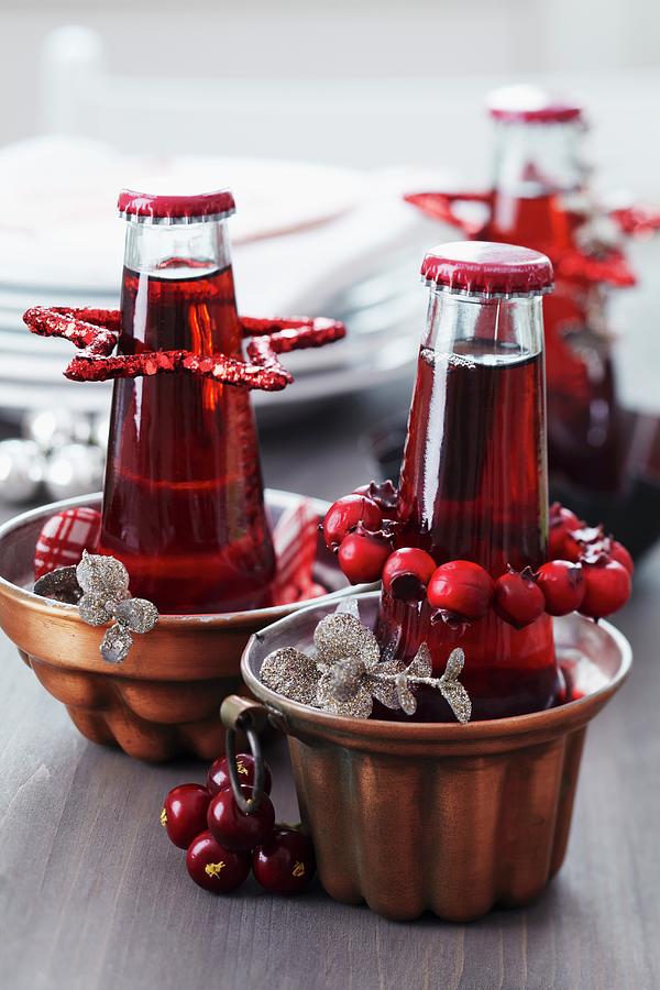 Copper Jelly Moulds Used As Bottle Coolers And Festively Decorated Photograph by Franziska Taube
