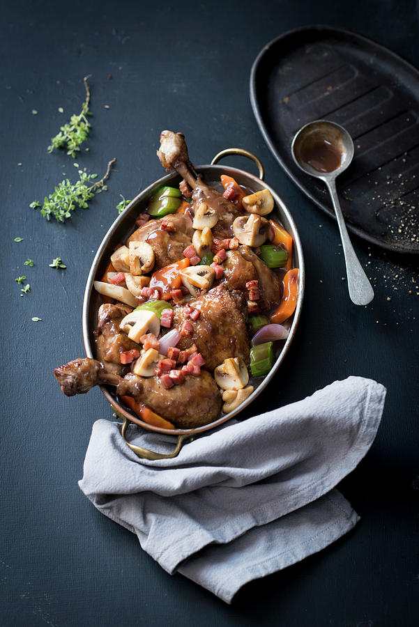 Coq Au Vin With Bacon And Mushrooms Photograph by Manuela Rther