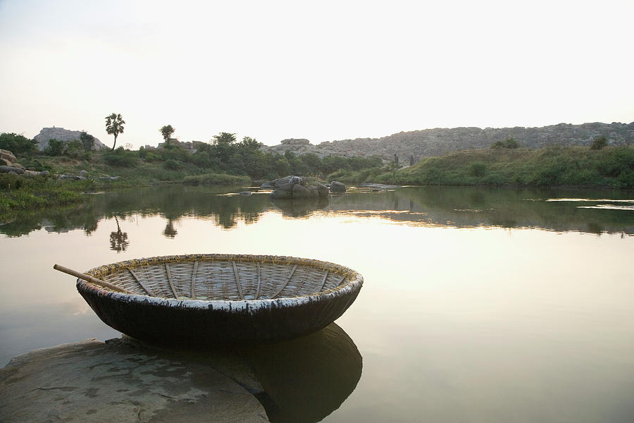 Coracle At The Bank Of A River Photograph by Exotica.im Coracle At The Bank Of A River Photograph by Exotica.im