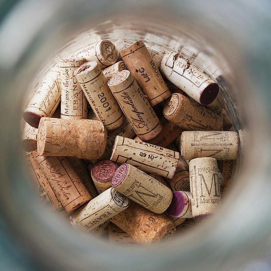 Corks In A Glass Container Photograph by Lutt, Carine