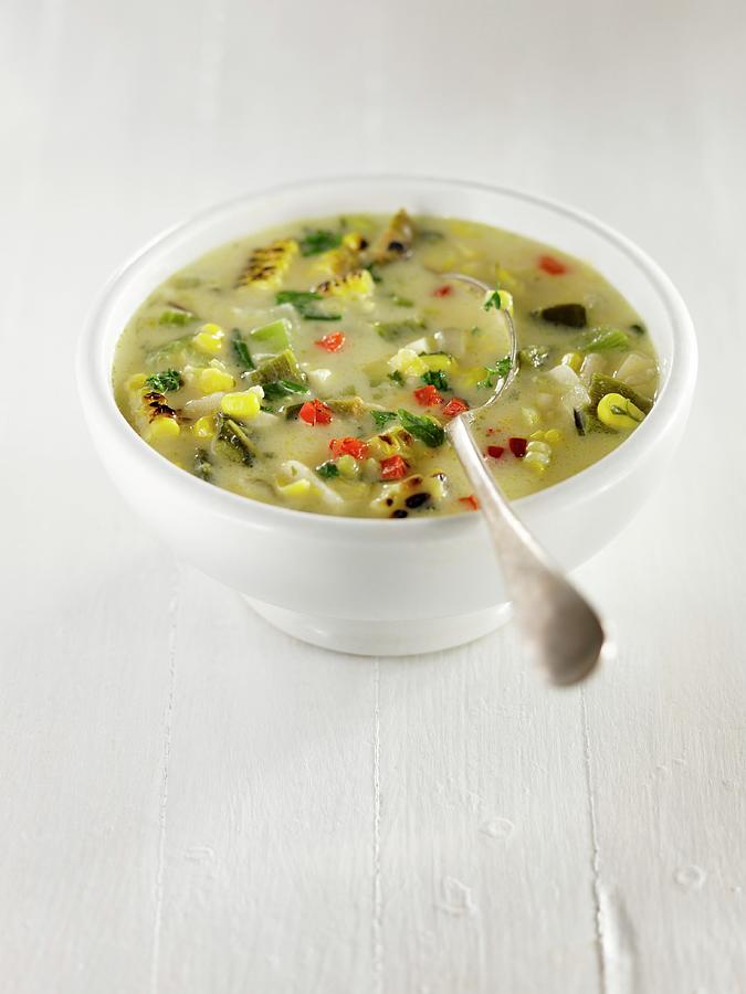 Corn Chowder With Potatoes, Red And Green Peppers, Celery, Parsley And Onions Photograph by Laurie Proffitt