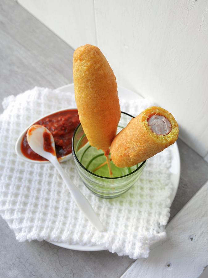 Corn Dogs With Tomato Sauce Photograph by Strmer, Thorsten