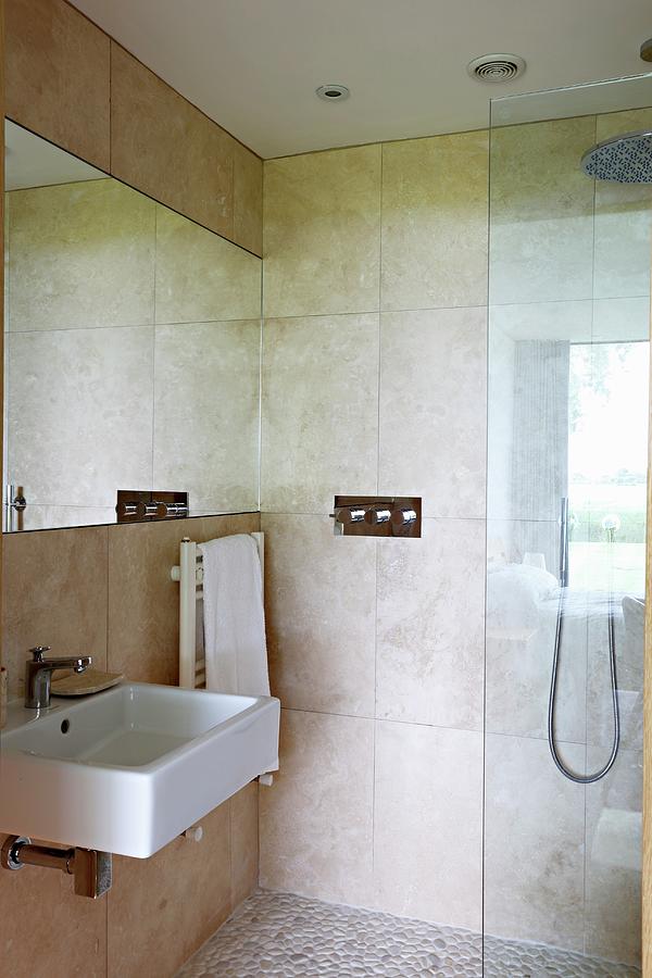 Corner Of Elegant Bathroom With Large Wall Tiles And Glazed Shower Area Photograph by Wayne Vincent