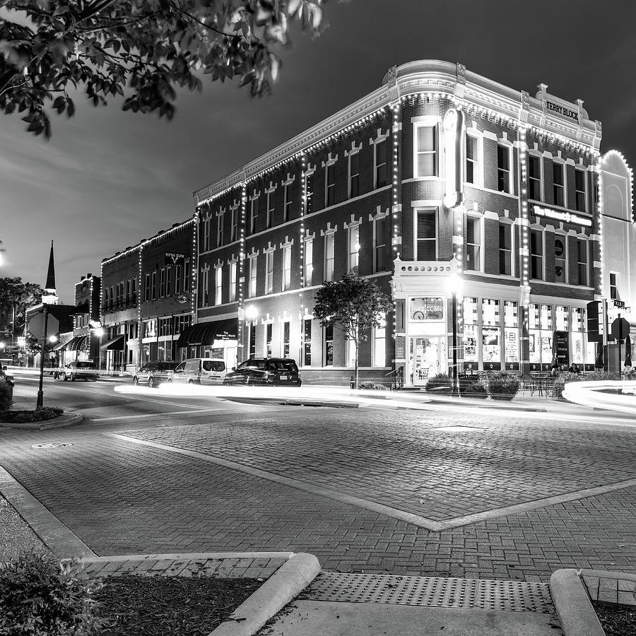 Black And White Photograph - Corner View of the Downtown Bentonville Arkansas Skyline in Monochrome 1x1 by Gregory Ballos