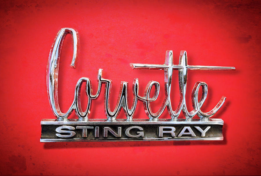 Corvette Sting Ray Emblem Textured Background Photograph by Arttography LLC