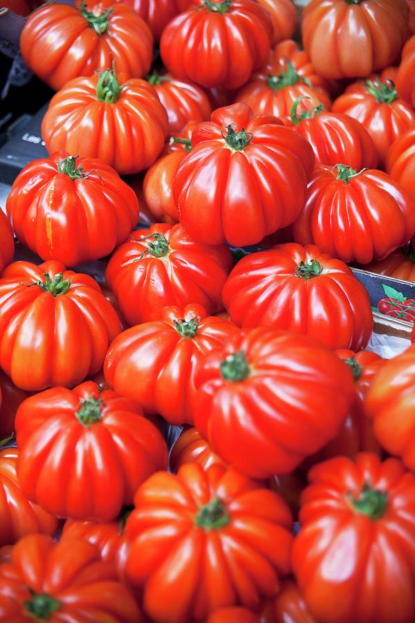 Costoluto Genovese Tomatoes On A Market Stall Photograph by George Blomfield