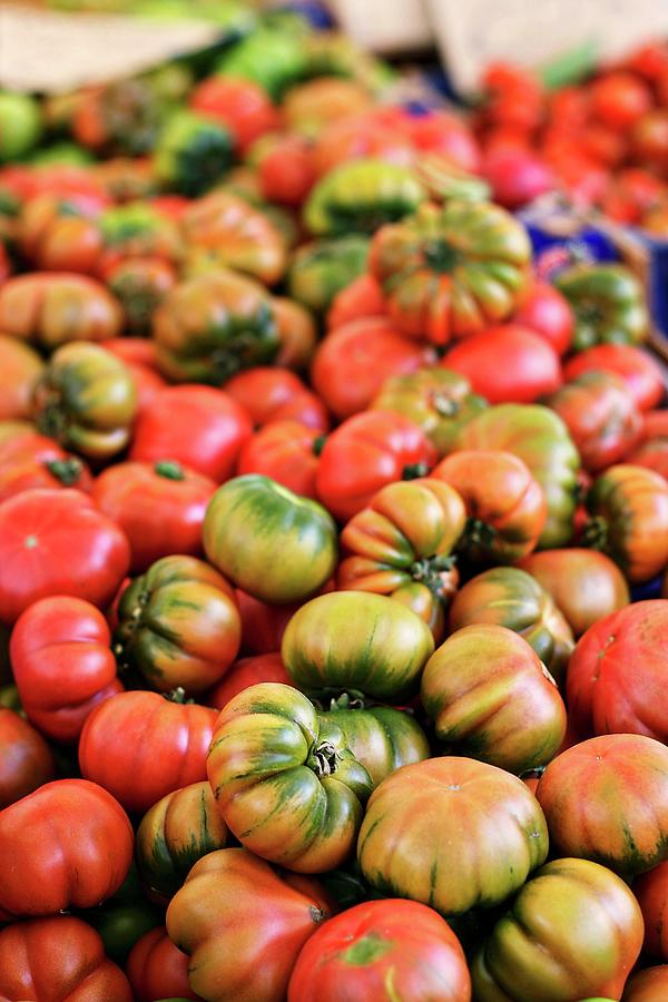 Costoluto Tomatoes On A Market Stand Photograph by Alexandra Panella