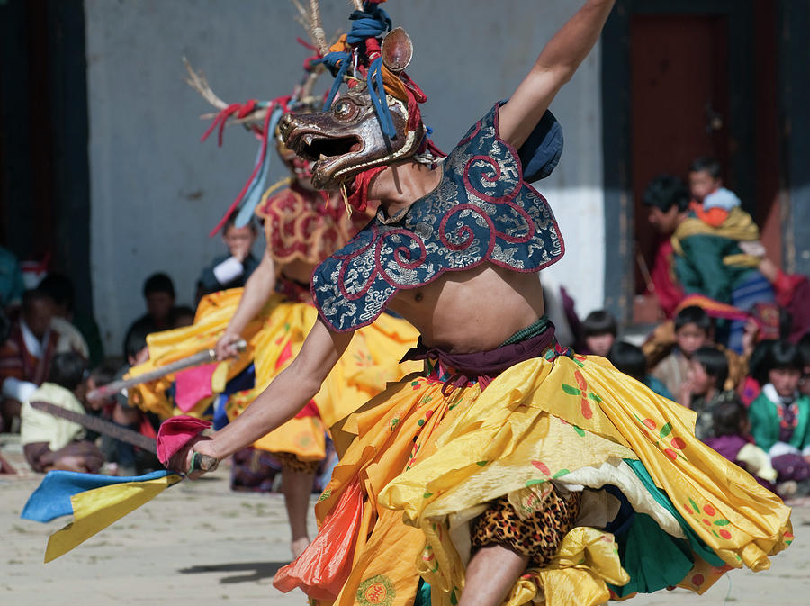 Costumed Dancer In Traditional Bhutan Photograph by Leezsnow