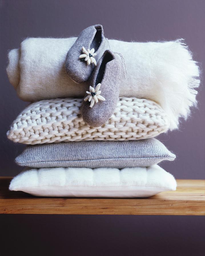 Still Life Photograph - Cosy Cushions, Blanket And Felt Slippers by Matteo Manduzio