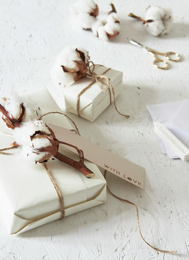 Cotton Bolls And Tags Decorating Wrapped Gifts Photograph by Hsfoto