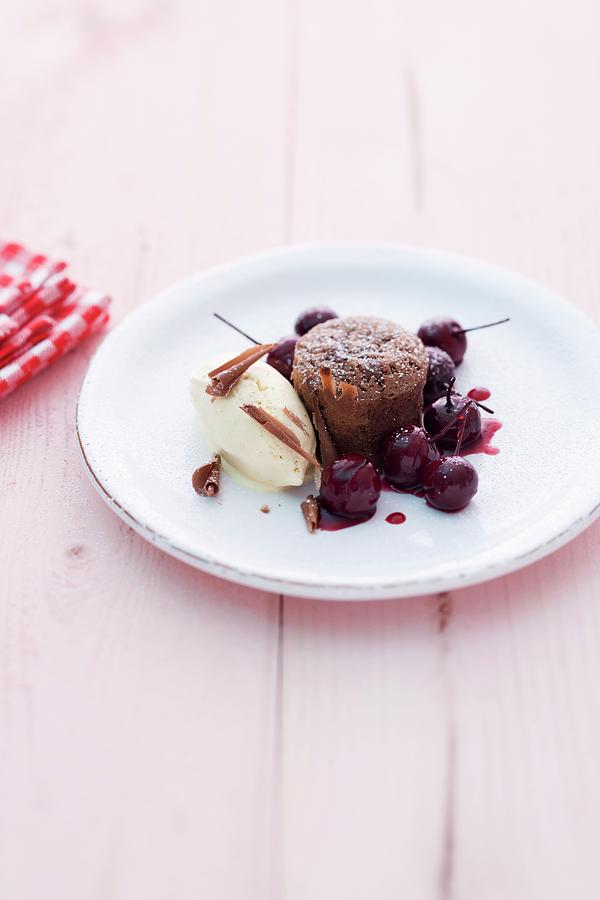 Coulant Au Chocolat With Cherries And Vanilla Ice Cream Photograph by Michael Wissing