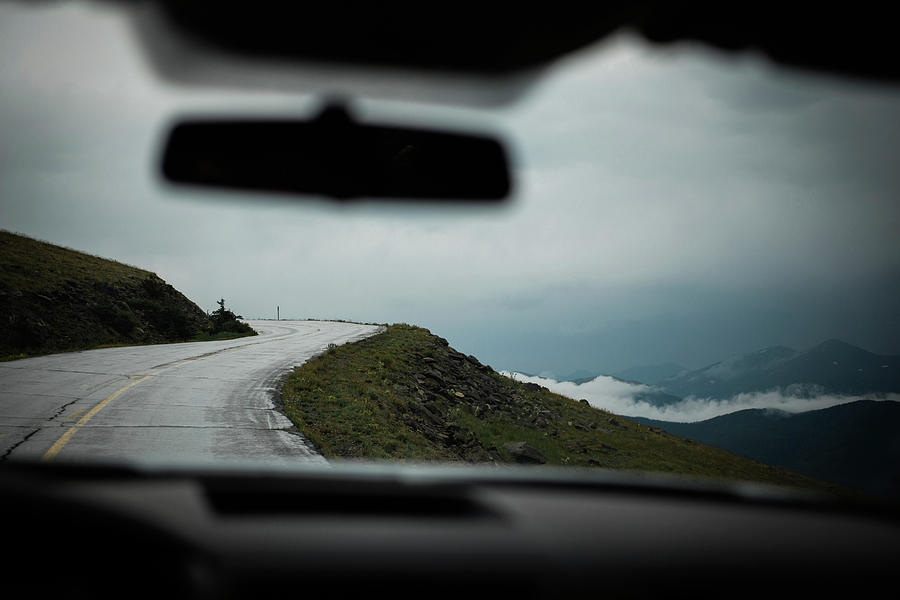 Mountain Photograph - Country Road By Clouds Covered Mountains Seen Through Car Windshield by Cavan Images
