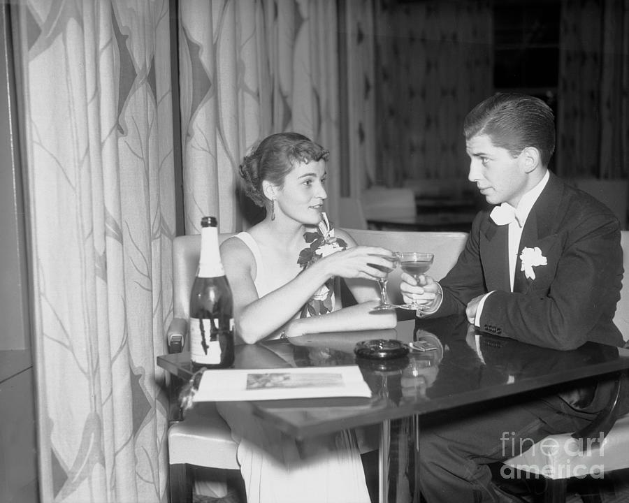Couple Drinking Champagne At Rainbow Photograph by Bettmann